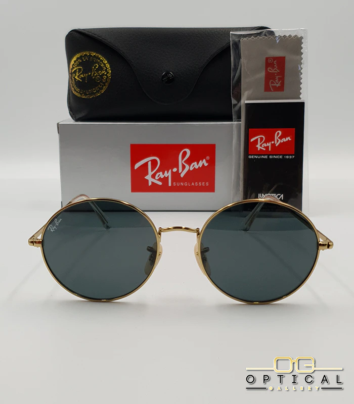 Lunettes de soleil de luxe Ray-Ban Oval RB1970 dorées avec verres foncés, étui en cuir et packaging d'origine - Optical Gallery.