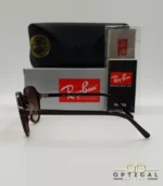 Lunettes de soleil Ray-Ban Thalia RB2195 avec monture fine en acétate écaille de tortue et verres teintés, présentées avec leur étui noir - Optical Gallery.