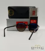 Lunettes de soleil Ray-Ban Thalia RB2195 avec monture fine en acétate écaille de tortue et verres teintés, présentées avec leur étui noir - Optical Gallery.