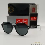 Lunettes de soleil Ray-Ban Thalia RB2195 avec monture en acétate noir brillant et verres teintés foncés, présentées avec leur étui noir et le logo Optical Gallery.