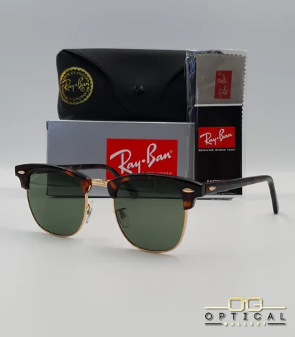 Lunettes de soleil Ray-Ban Clubmaster RB3016 monture écaille de tortue et métal doré avec verres verts G-15, étui et boîte d'origine.