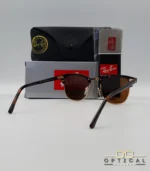 Lunettes de soleil Ray-Ban Clubmaster RB3016 monture écaille de tortue et métal doré avec verres marrons, étui et boîte d'origine.
