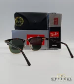 Lunettes de soleil Ray-Ban Clubmaster RB3016 monture écaille de tortue et métal doré avec verres verts G-15, étui et boîte d'origine.