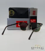 Lunettes de soleil Ray-Ban Clubmaster RB3016 monture écaille de tortue et métal doré avec verres verts G-15, étui et boîte d'origine.