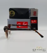 Lunettes de soleil Ray-Ban Clubmaster RB3016 monture écaille de tortue et métal doré avec verres marrons, étui et boîte d'origine.