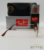 Lunettes de soleil Ray-Ban Aviator RB3025 monture métallique dorée avec verres marrons classiques B-15, étui et boîte d'origine.