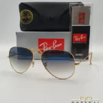 Lunettes de soleil Ray-Ban Aviator RB3025 monture métallique dorée avec verres dégradés bleus, étui et boîte d'origine.