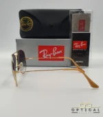 Lunettes de soleil Ray-Ban Aviator RB3025 monture métallique dorée avec verres dégradés bleus, étui et boîte d'origine.