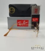 Lunettes de soleil Ray-Ban Aviator RB3025 monture métallique dorée avec verres dégradés bleus, étui et boîte d'origine.
