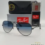 Lunettes de soleil Ray-Ban Aviator RB3025 monture métallique noire avec verres dégradés bleus, étui et boîte d'origine.