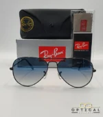 Lunettes de soleil Ray-Ban Aviator RB3025 monture métallique noire avec verres dégradés bleus, étui et boîte d'origine.