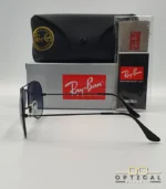 Lunettes de soleil Ray-Ban Aviator RB3025 monture métallique noire avec verres dégradés bleus, étui et boîte d'origine.