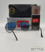 Lunettes de soleil Ray-Ban Aviator RB3025 monture métallique noire avec verres dégradés bleus, étui et boîte d'origine.