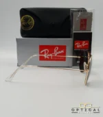 Lunettes de soleil Ray-Ban Aviator RB3025 monture métallique dorée avec verres noirs, étui et boîte d'origine.