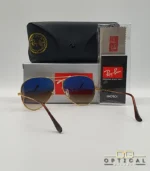 Lunettes de soleil Ray-Ban Aviator RB3025 monture métallique dorée avec verres dégradés marrons, étui et boîte d'origine.