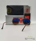 Lunettes de soleil Ray-Ban Aviator RB3025 monture métallique dorée avec verres dégradés marrons, étui et boîte d'origine.