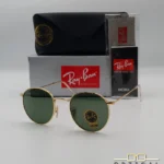 Lunettes de soleil Ray-Ban Round Metal RB3447 monture métallique dorée avec verres verts G-15, étui et boîte d'origine.