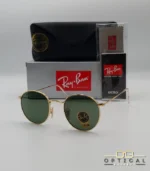 Lunettes de soleil Ray-Ban Round Metal RB3447 monture métallique dorée avec verres verts G-15, étui et boîte d'origine.