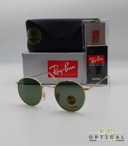 Lunettes de soleil Ray-Ban Round Metal RB3447 monture métallique dorée avec verres verts G-15, étui et boîte d'origine.
