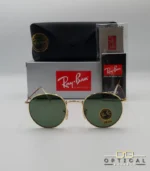 Lunettes de soleil Ray-Ban Round Metal RB3447 monture métallique dorée avec verres verts G-15, étui et boîte d'origine.