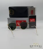 Lunettes de soleil Ray-Ban Round Metal RB3447 monture métallique dorée avec verres verts G-15, étui et boîte d'origine.
