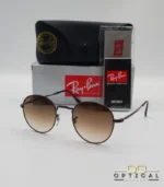 Lunettes de soleil Ray-Ban Round Metal RB3447 monture métallique marron brillant avec verres dégradés marrons, étui et boîte d'origine.
