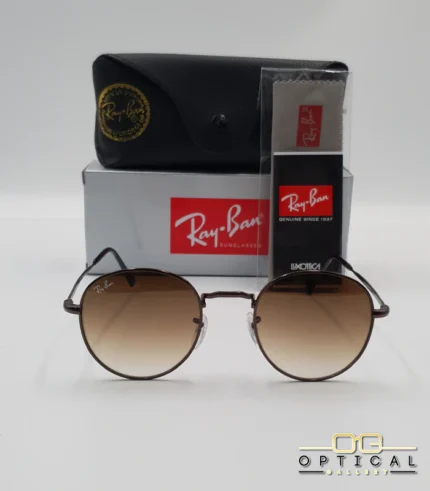 Lunettes de soleil Ray-Ban Round Metal RB3447 monture métallique marron brillant avec verres dégradés marrons, étui et boîte d'origine.