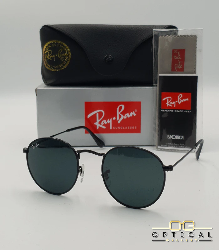 Lunettes de soleil Ray-Ban Round Metal RB3447 - Noir Mat / Noir Lunettes de soleil Ray-Ban Round Metal RB3447 monture métallique noire mate avec verres noirs, étui et boîte d'origine.