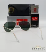 Lunettes de soleil Ray-Ban Aviator RB3025 monture métallique dorée avec verres verts G-15, étui et boîte d'origine.