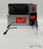 Lunettes de soleil Ray-Ban Aviator RB3025 monture métallique argentée avec verres dégradés bleus, étui et boîte d'origine.