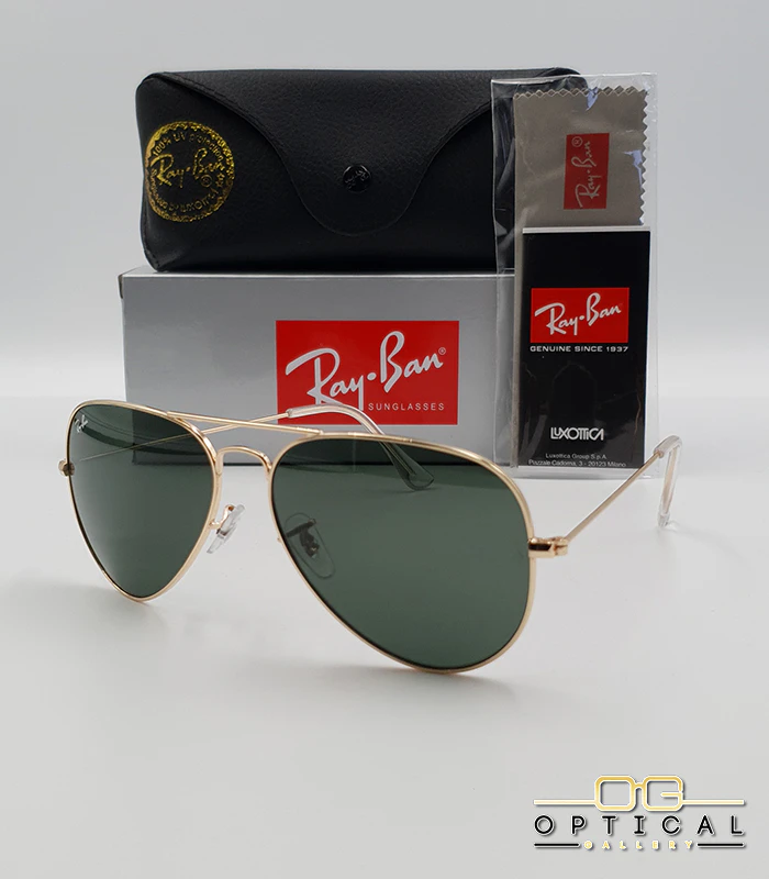 Lunettes de soleil Ray-Ban Aviator RB3025 - Doré / Vert G-15 Lunettes de soleil Ray-Ban Aviator RB3025 monture métallique dorée avec verres verts G-15, étui et boîte d'origine.