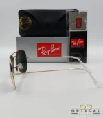 Lunettes de soleil Ray-Ban Aviator RB3025 monture métallique dorée avec verres verts G-15, étui et boîte d'origine.