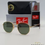 Lunettes de soleil Ray-Ban Hexagonal Flat Lenses RB3548N monture métallique dorée avec verres dégradés bleus, étui et boîte d'origine.
