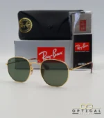 Lunettes de soleil Ray-Ban Hexagonal Flat Lenses RB3548N monture métallique dorée avec verres dégradés bleus, étui et boîte d'origine.