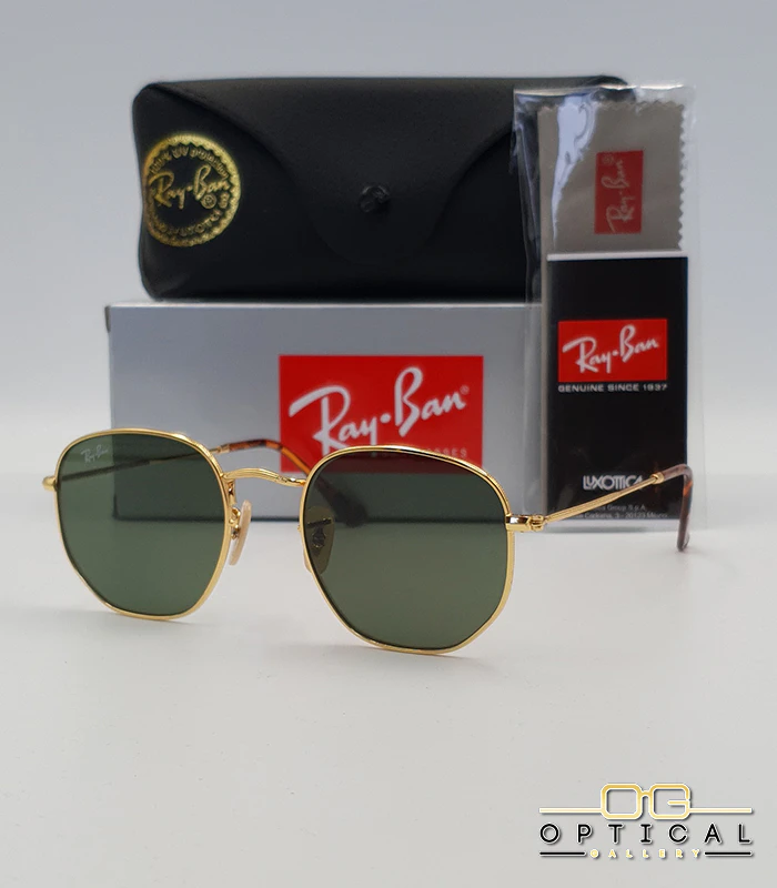 Lunettes de soleil Ray-Ban Hexagonal RB3548N - Doré / Bleu Dégradé Lunettes de soleil Ray-Ban Hexagonal Flat Lenses RB3548N monture métallique dorée avec verres dégradés bleus, étui et boîte d'origine.
