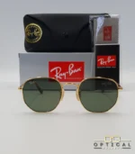 Lunettes de soleil Ray-Ban Hexagonal Flat Lenses RB3548N monture métallique dorée avec verres dégradés bleus, étui et boîte d'origine.
