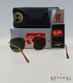 Lunettes de soleil Ray-Ban Hexagonal Flat Lenses RB3548N monture métallique dorée avec verres dégradés bleus, étui et boîte d'origine.