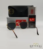 Lunettes de soleil Ray-Ban Aviator RB3025 monture métallique dorée avec verres dégradés bleus, étui et boîte d'origine.