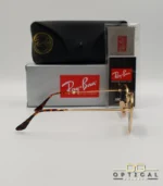 Lunettes de soleil Ray-Ban Aviator RB3025 monture métallique dorée avec verres dégradés bleus, étui et boîte d'origine.