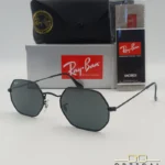 Lunettes de soleil Ray-Ban Octagonal RB3556 noires avec verres noirs, étui rigide, boîte grise et livret Luxottica.