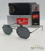 Lunettes de soleil Ray-Ban Octagonal RB3556 noires avec verres noirs, étui rigide, boîte grise et livret Luxottica.