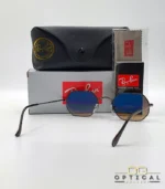 Lunettes de soleil Ray-Ban Octagonal RB3556 marron bronze avec verres dégradés marrons, étui noir, boîte grise et livret Luxottica.