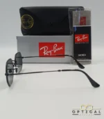 Lunettes de soleil Ray-Ban Octagonal RB3556 noires avec verres noirs, étui rigide, boîte grise et livret Luxottica.