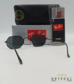 Lunettes de soleil Ray-Ban Octagonal RB3556 noires avec verres noirs, étui rigide, boîte grise et livret Luxottica.