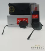Lunettes de soleil Ray-Ban Octagonal RB3556 noires avec verres noirs, étui rigide, boîte grise et livret Luxottica.