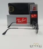 Lunettes de soleil Ray-Ban Octagonal RB3556 noires avec verres noirs, étui rigide, boîte grise et livret Luxottica.