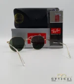Lunettes de soleil Ray-Ban Jack RB3565 dorées avec verres verts G-15, étui noir, boîte grise et livret de garantie chez Optical Gallery.