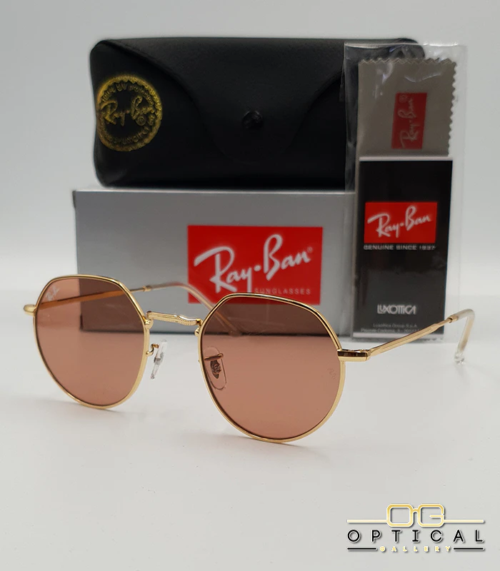 lunettes-de-soleil-ray-ban-jack-rb3565-or-rose-optical-gallery Lunettes de soleil Ray-Ban Jack RB3565 dorées avec verres roses marrons clairs, étui noir, boîte grise et livret de garantie chez Optical Gallery.