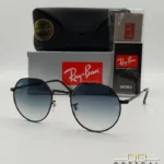 Lunettes de soleil Ray-Ban Jack RB3565 noires avec verres dégradés bleus gris, étui noir, boîte grise et livret de garantie chez Optical Gallery.