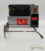 Lunettes de soleil Ray-Ban Jack RB3565 grises métalliques avec verres dégradés marrons, étui noir, boîte d'origine et livret de garantie chez Optical Gallery.
